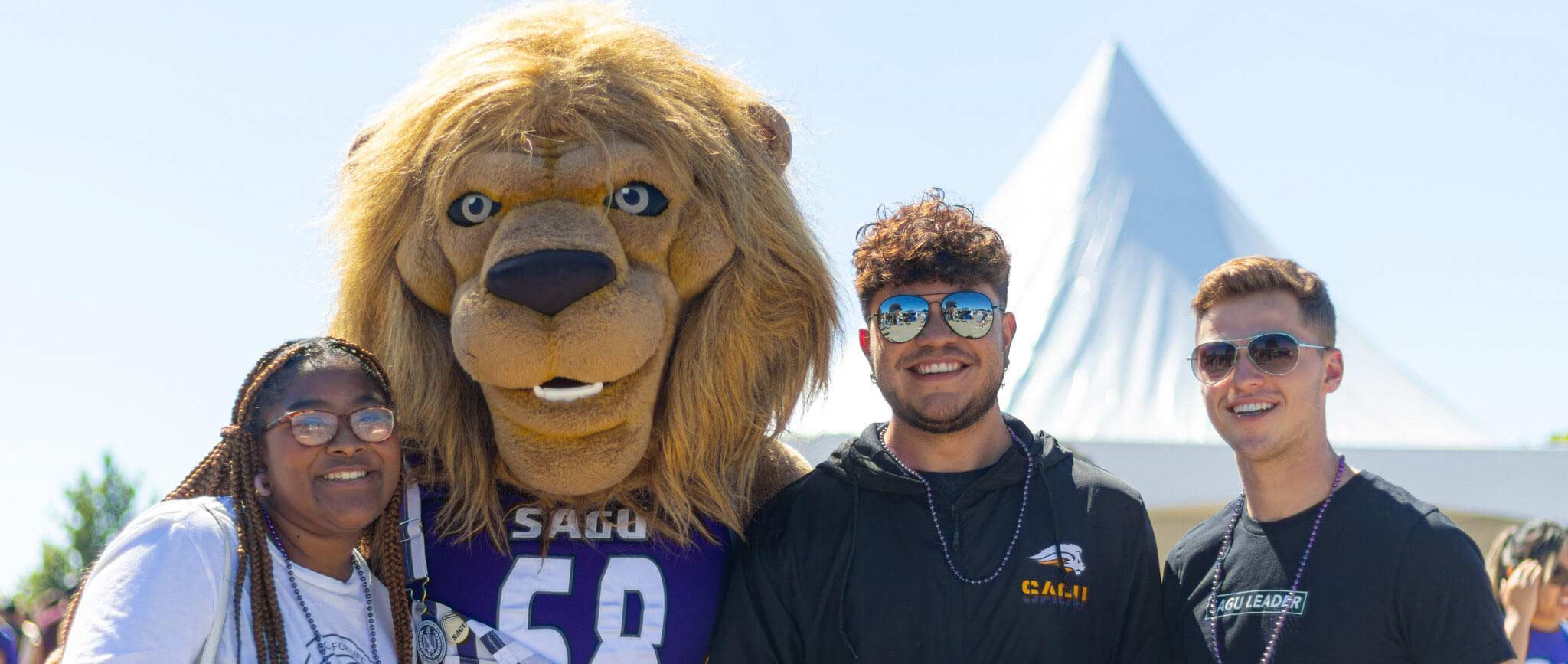 SAGU students with lion mascot